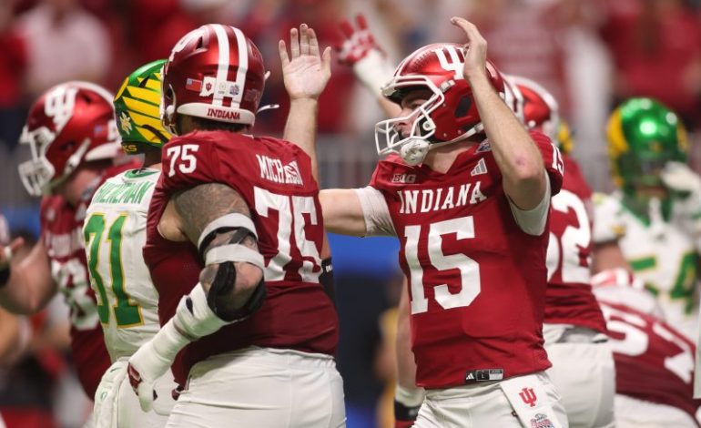  Who is favorite in national championship game, Indiana or Miami?